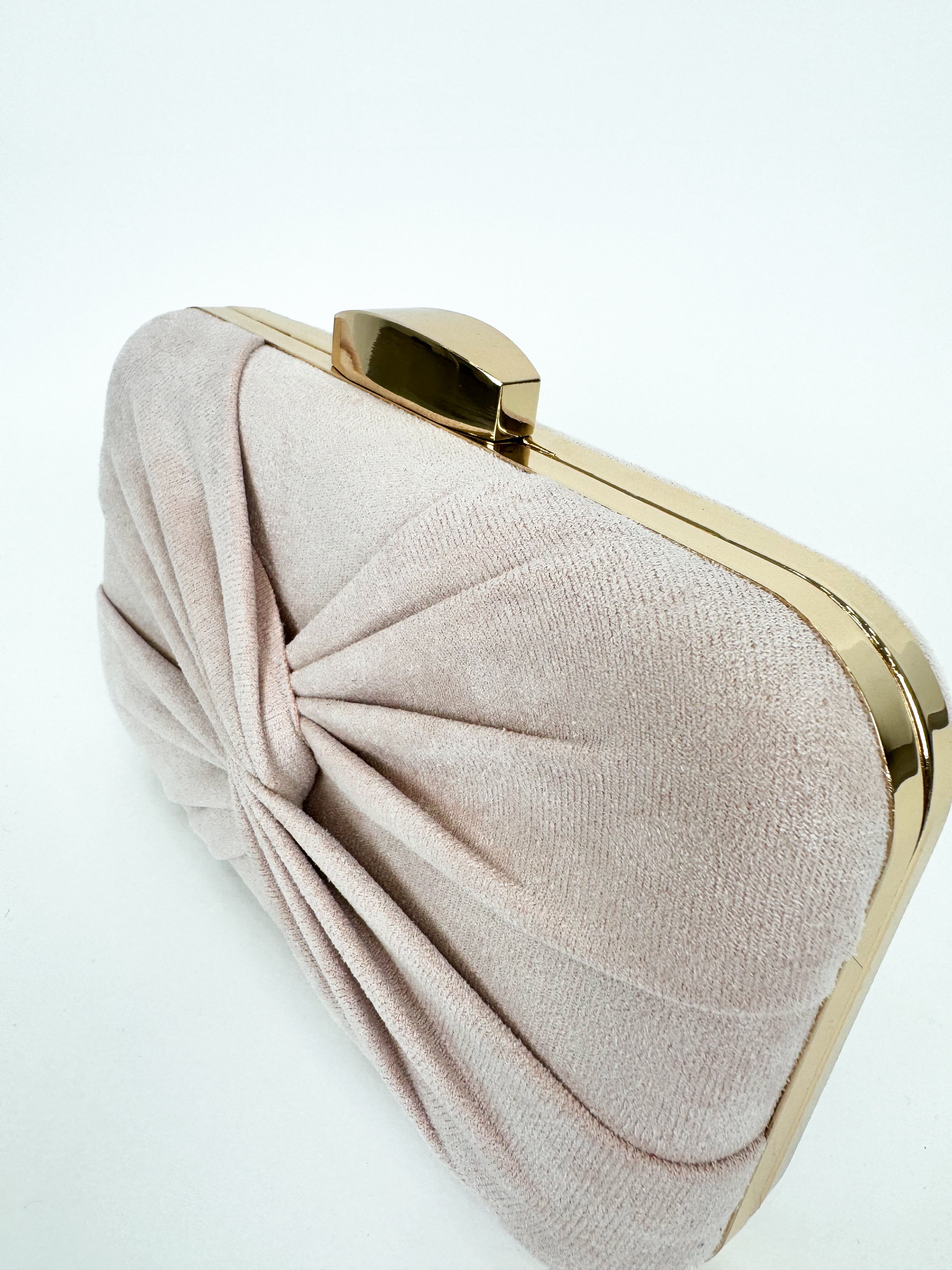 Pink crossed bow clutch