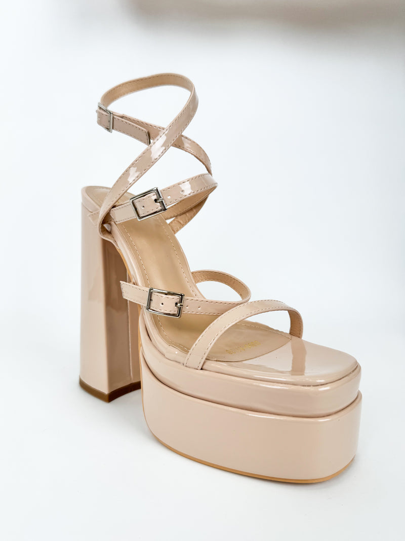 Nude buckled platform shoe