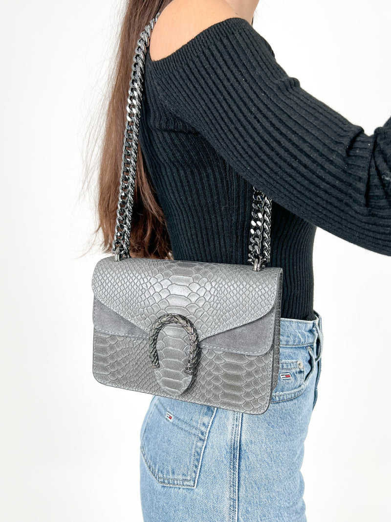 Grey leather horseshoe bag