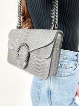 Grey leather horseshoe bag