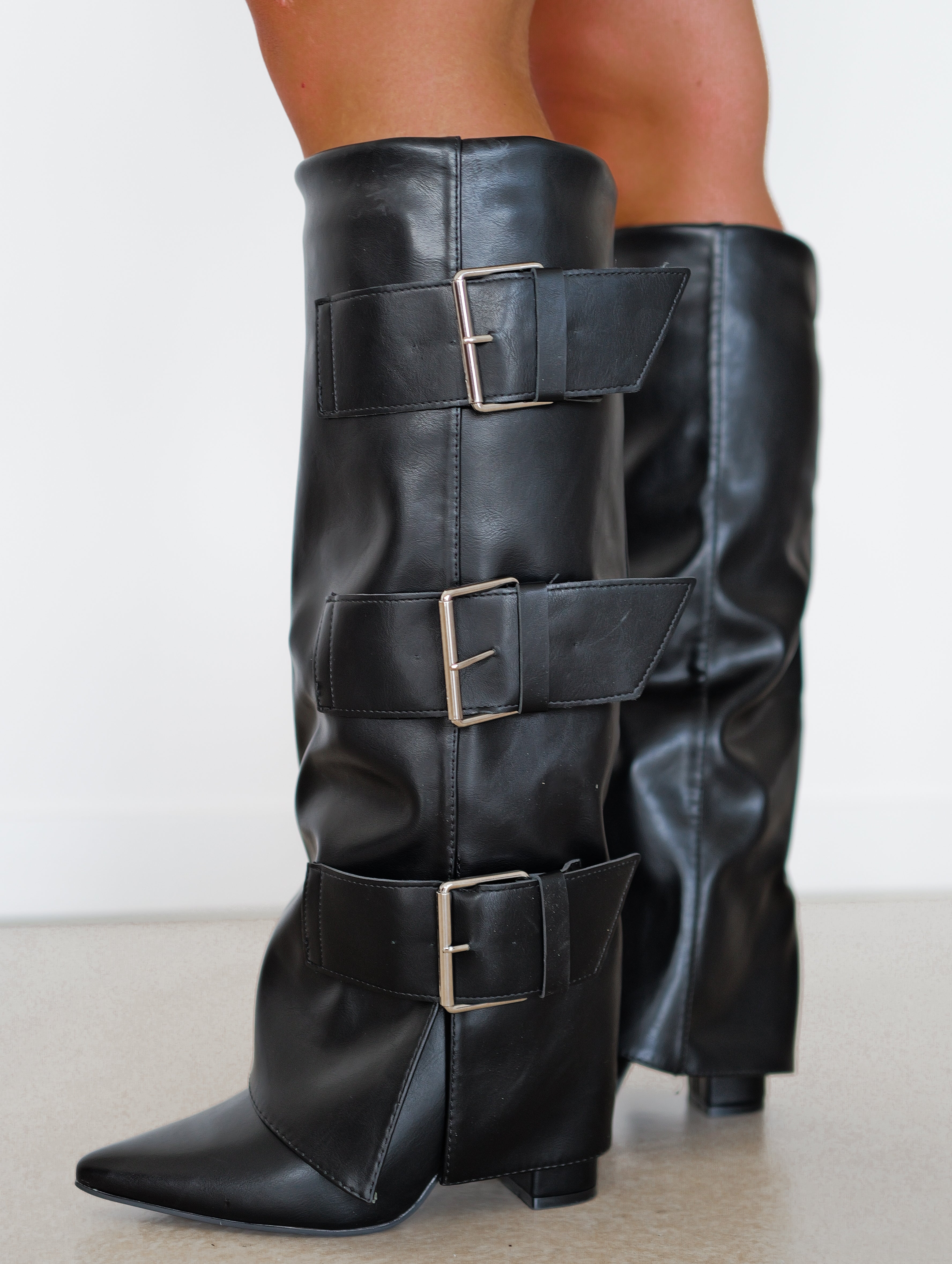 Heeled boot with silver buckles flap heel