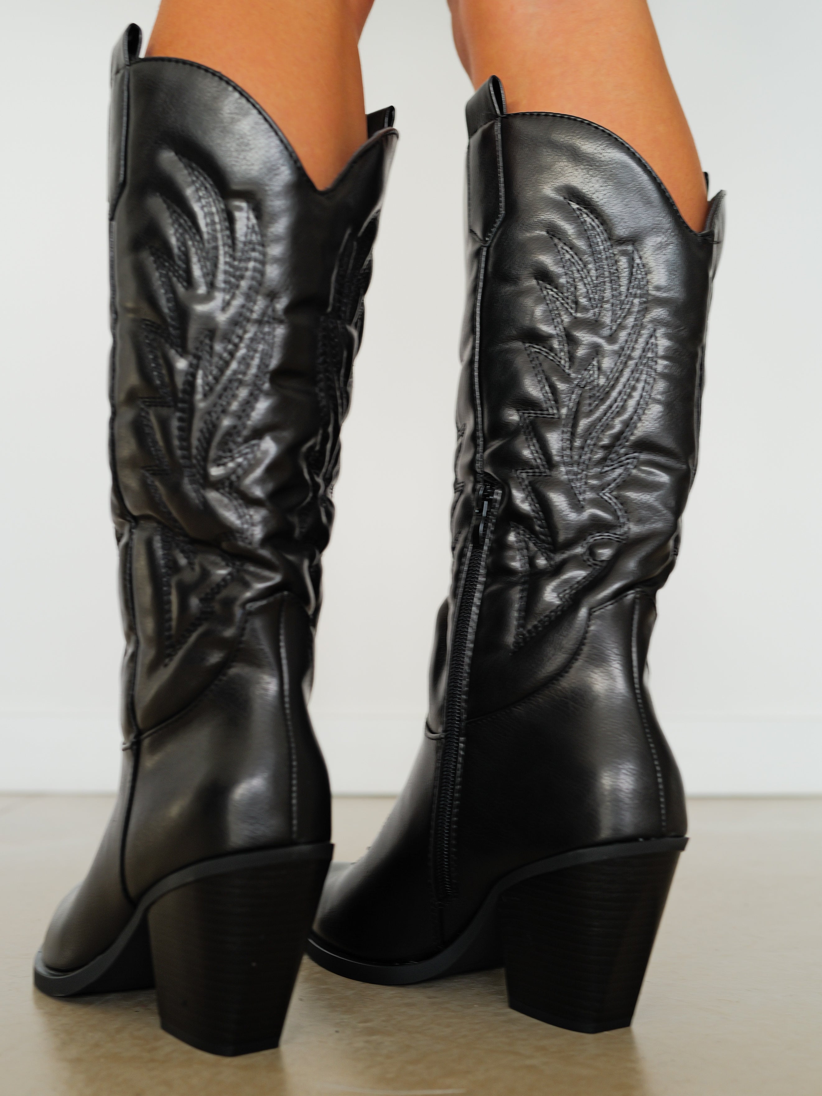 Black cowboy high boot