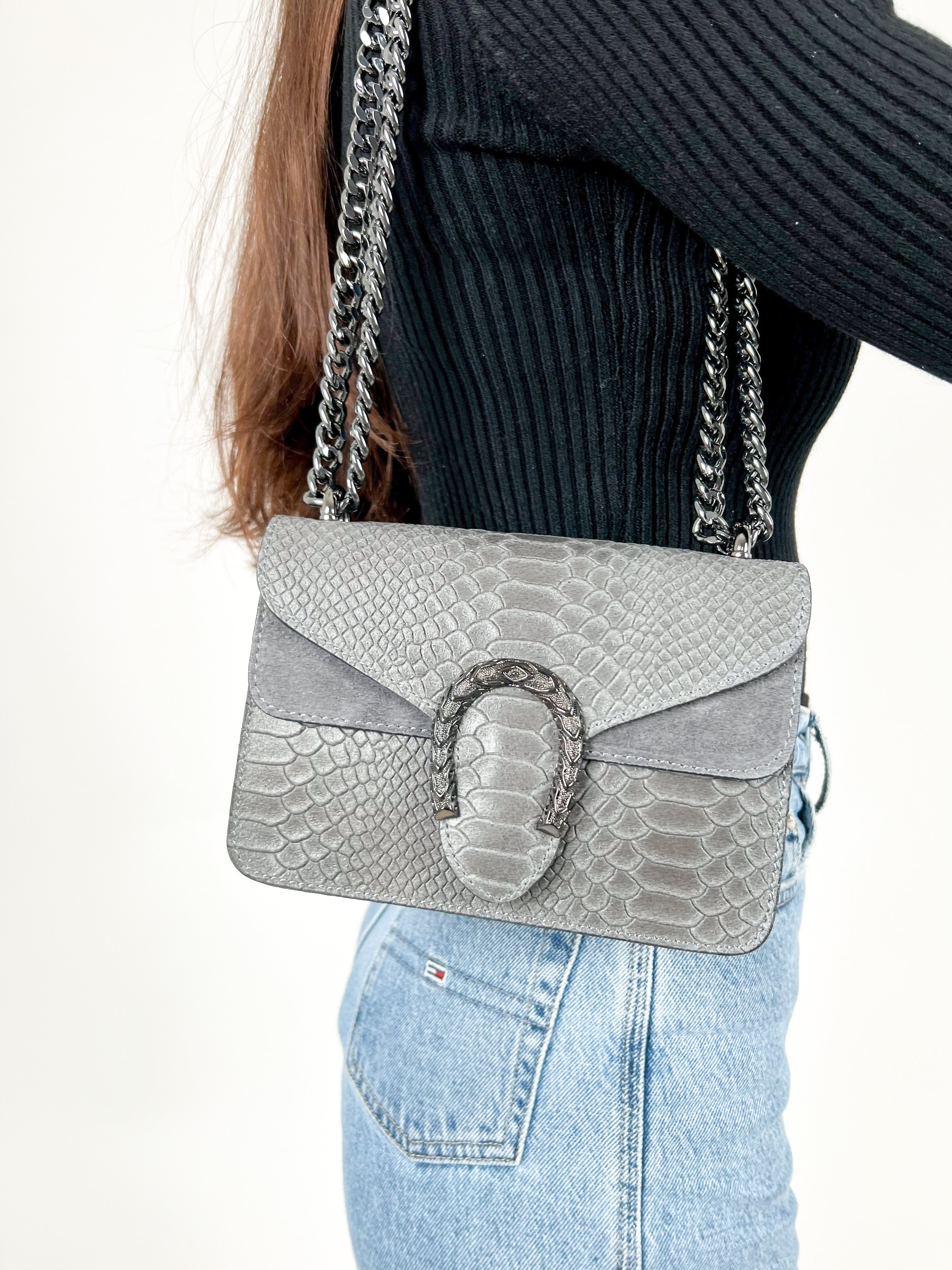 Grey leather horseshoe bag