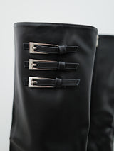 Smooth heeled boot with black buckles