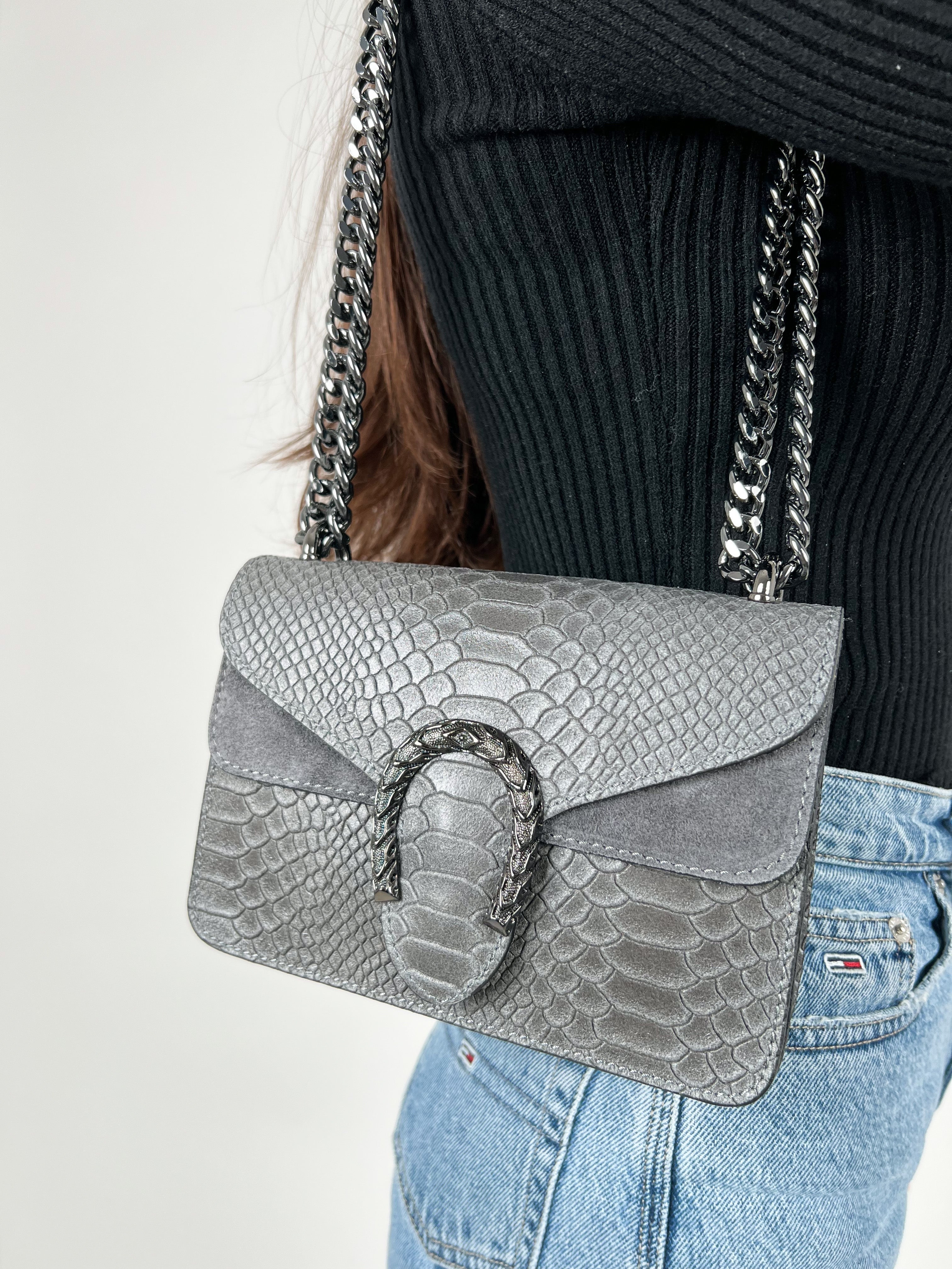 Grey leather horseshoe bag