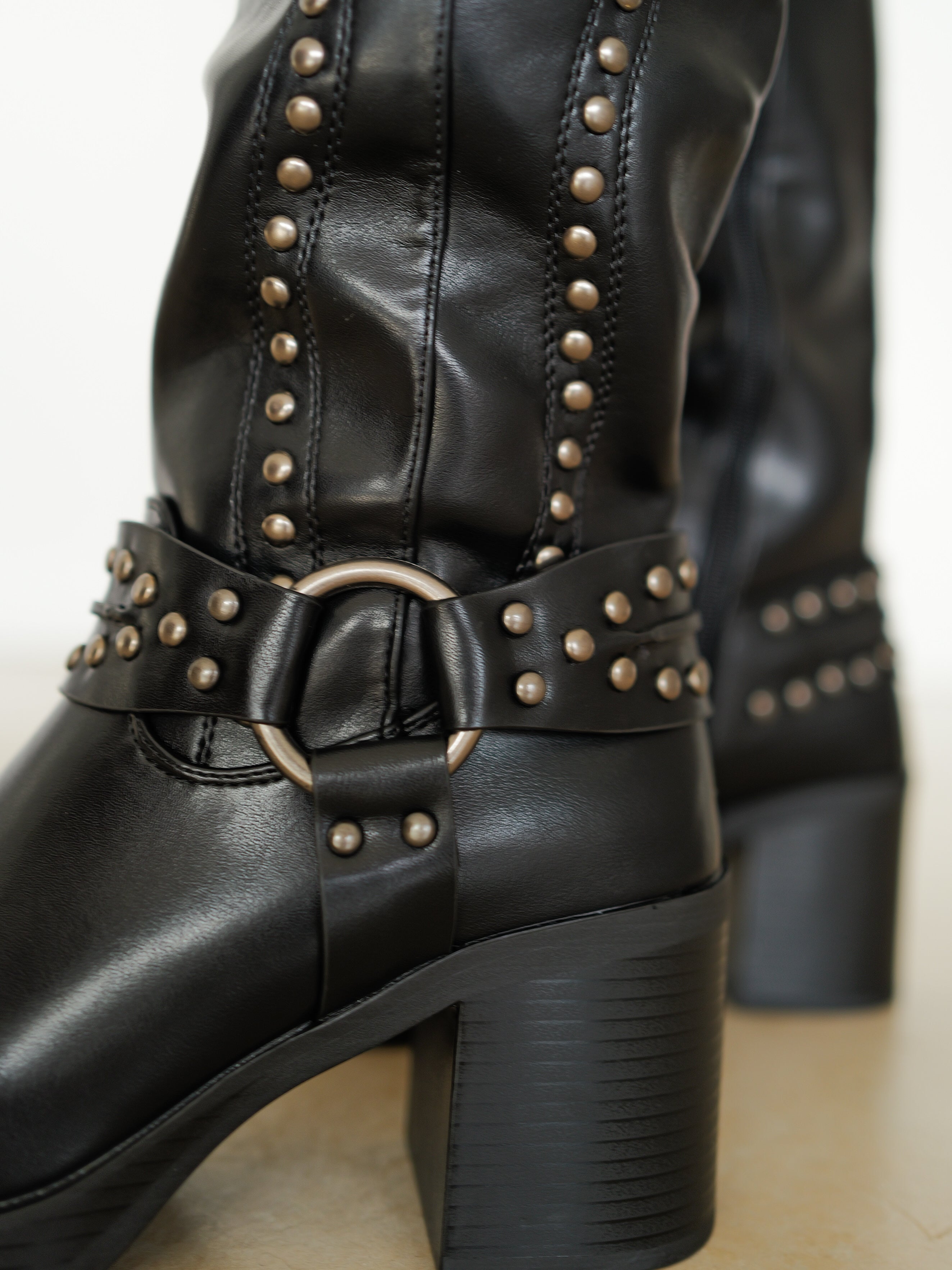 Black studded track boot