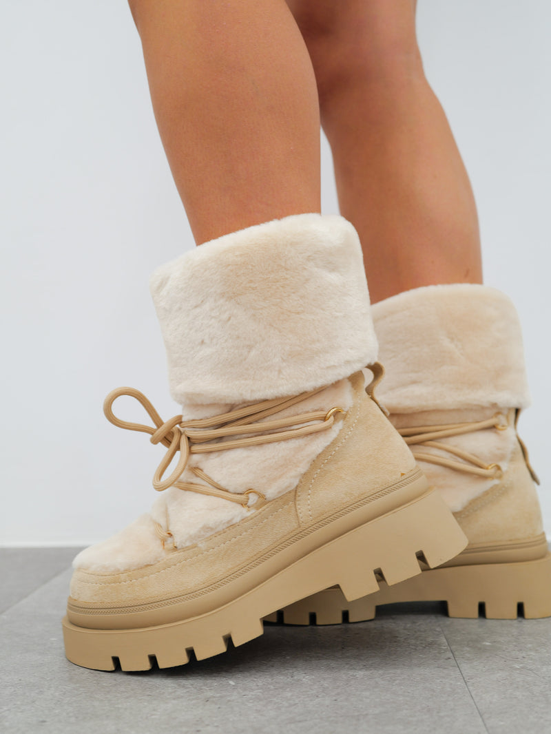 Beige furry ankle boots with laces detail