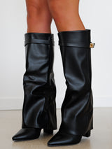 Heeled boot with black flap detail