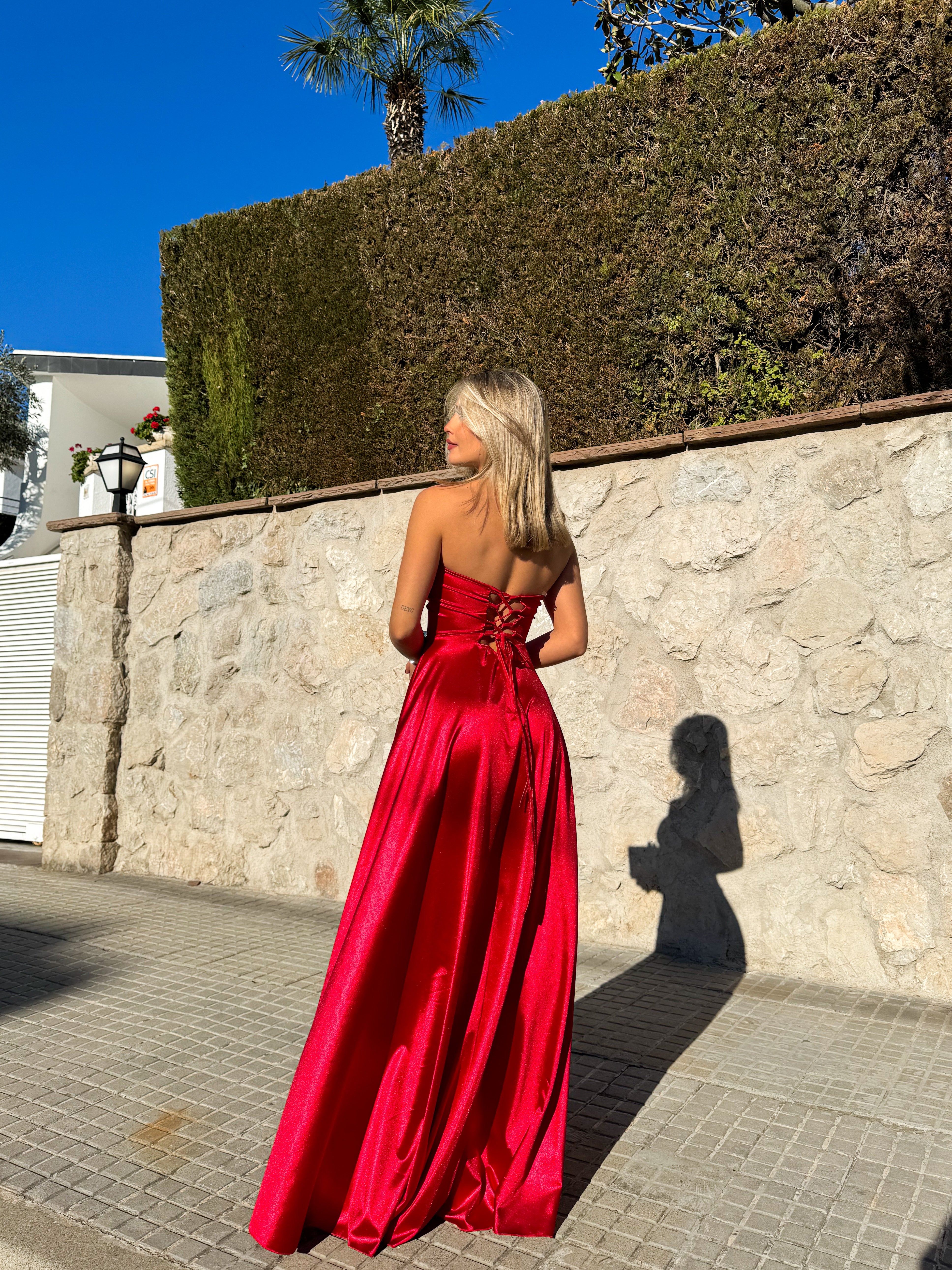 Red satin strapless dress