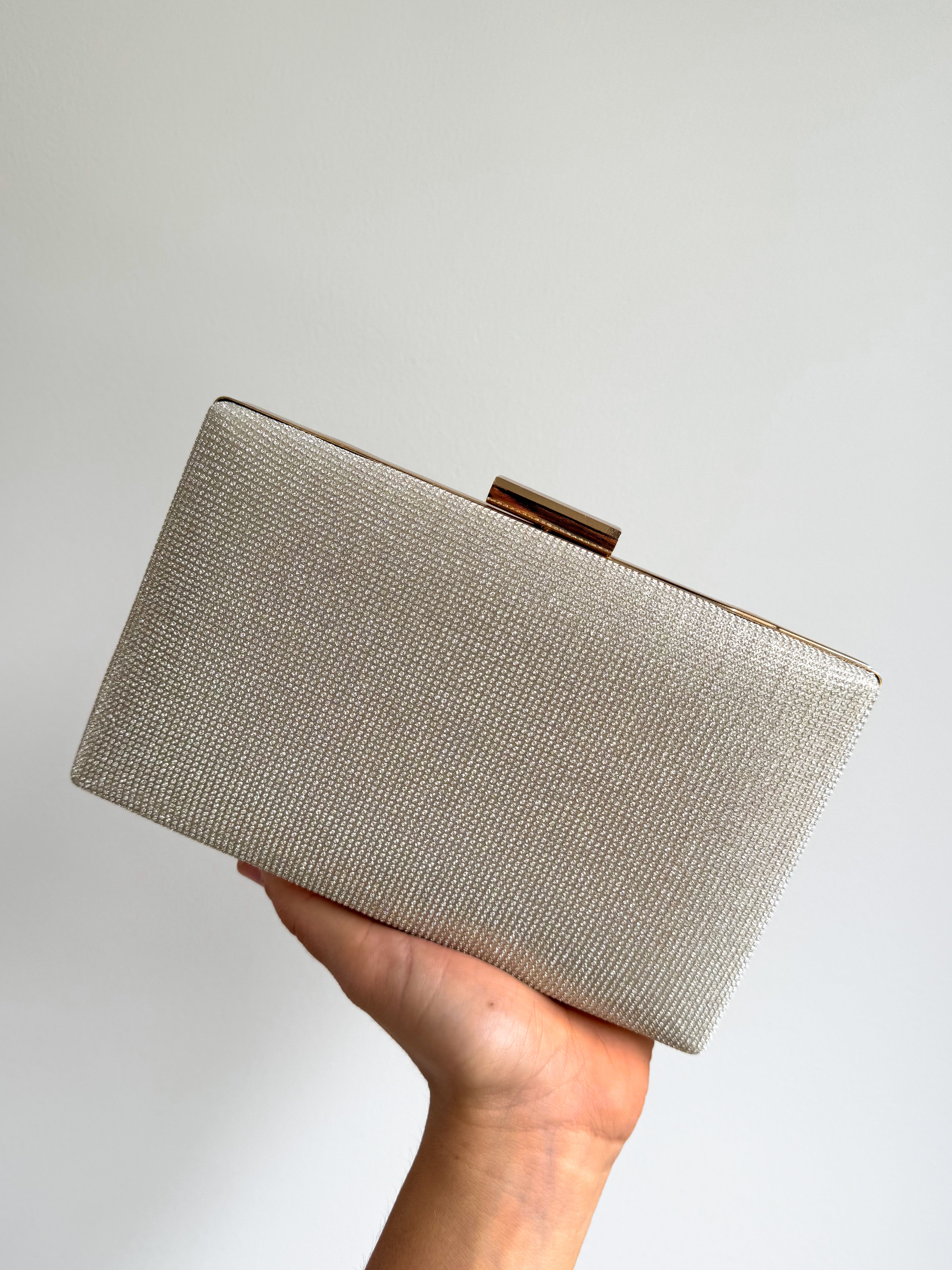 Gold rectangle glitter clutch