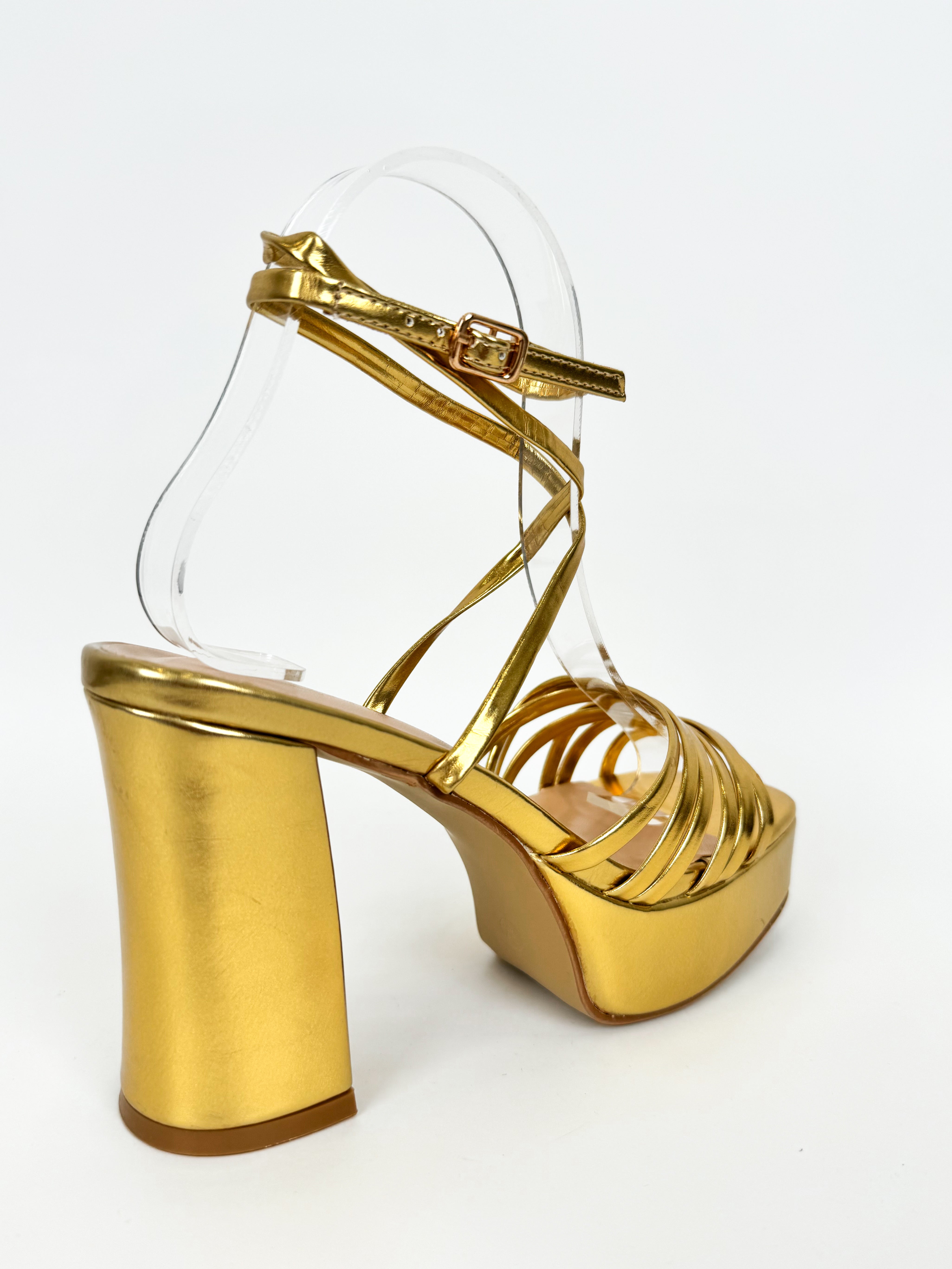 Sandal with golden straps platform heel