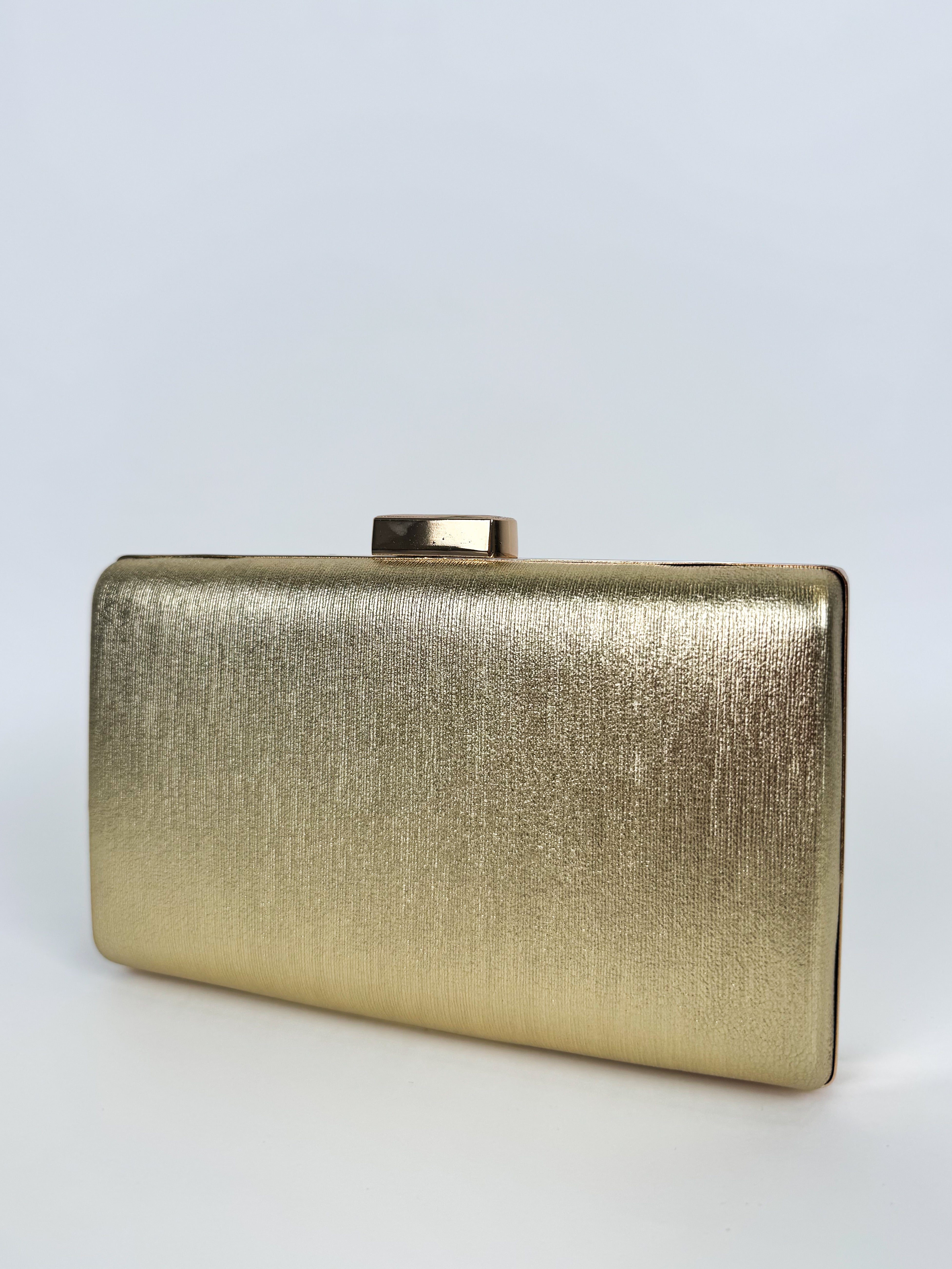 Gold banded clutch