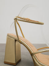 Golden shiny crossed sandal