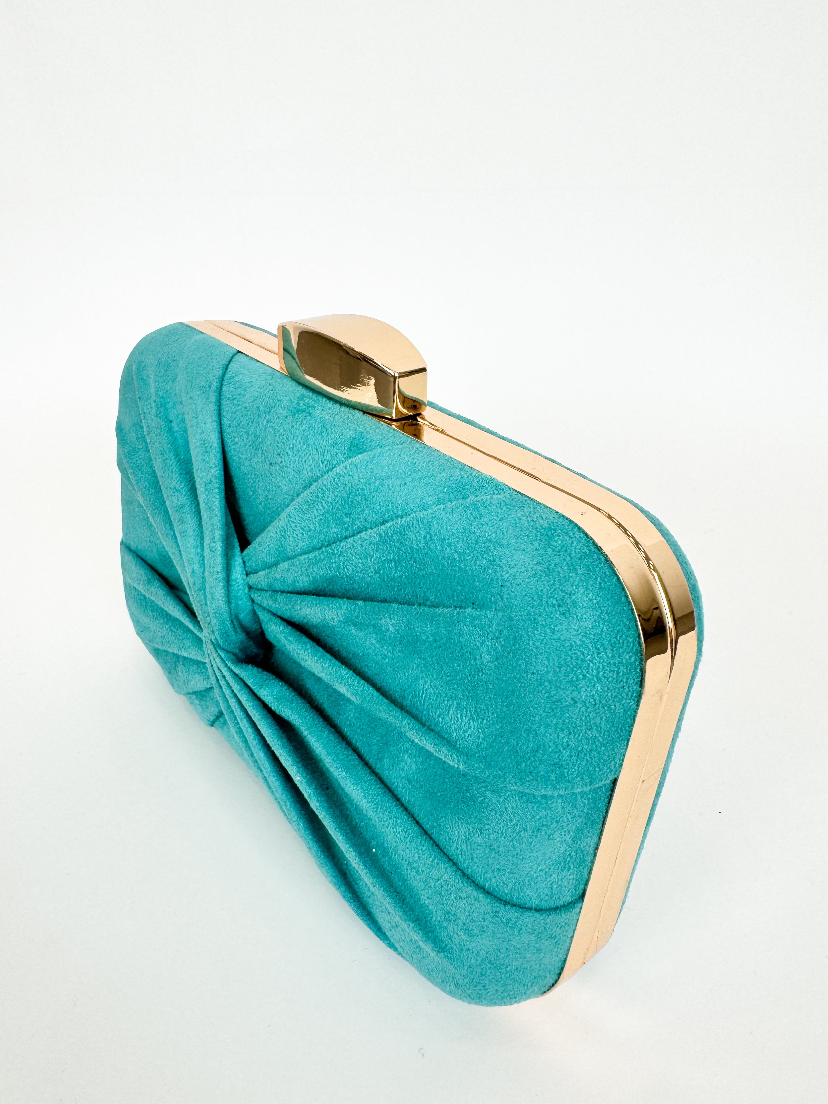 Turquoise cross bow clutch