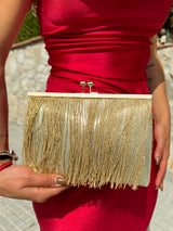 Gold fringed suede clutch