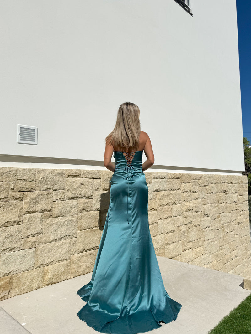 Turquoise dress with turquoise rhinestone drop