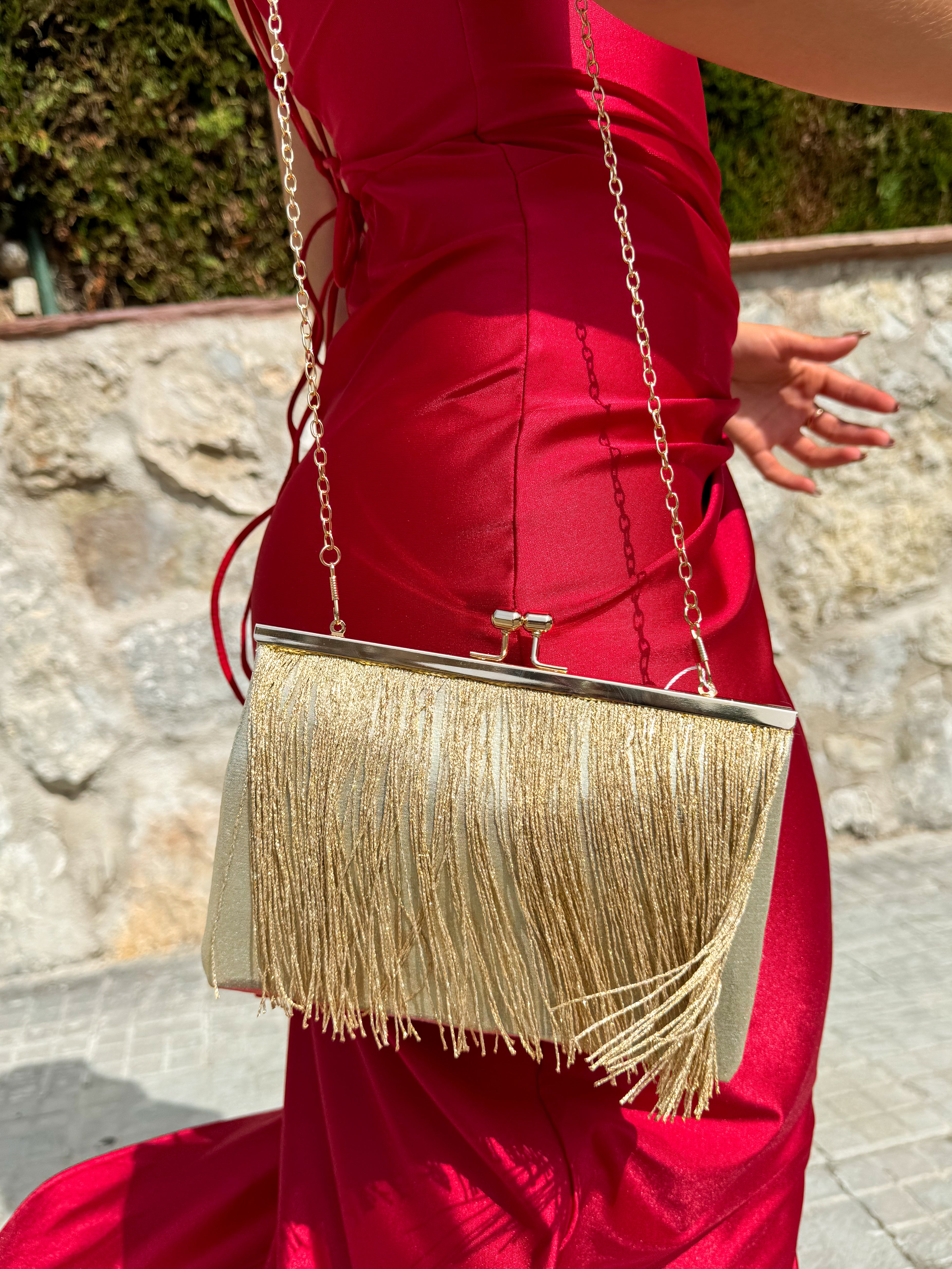 Gold fringed clutch