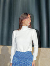 Plain white turtleneck sweater