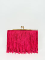 Fuchsia fringed suede clutch