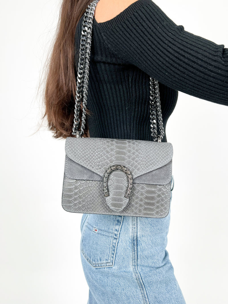 Grey leather horseshoe bag