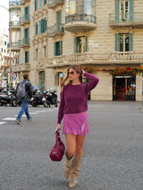 Burgundy leather handbag with pockets