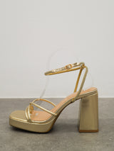 Golden shiny crossed sandal