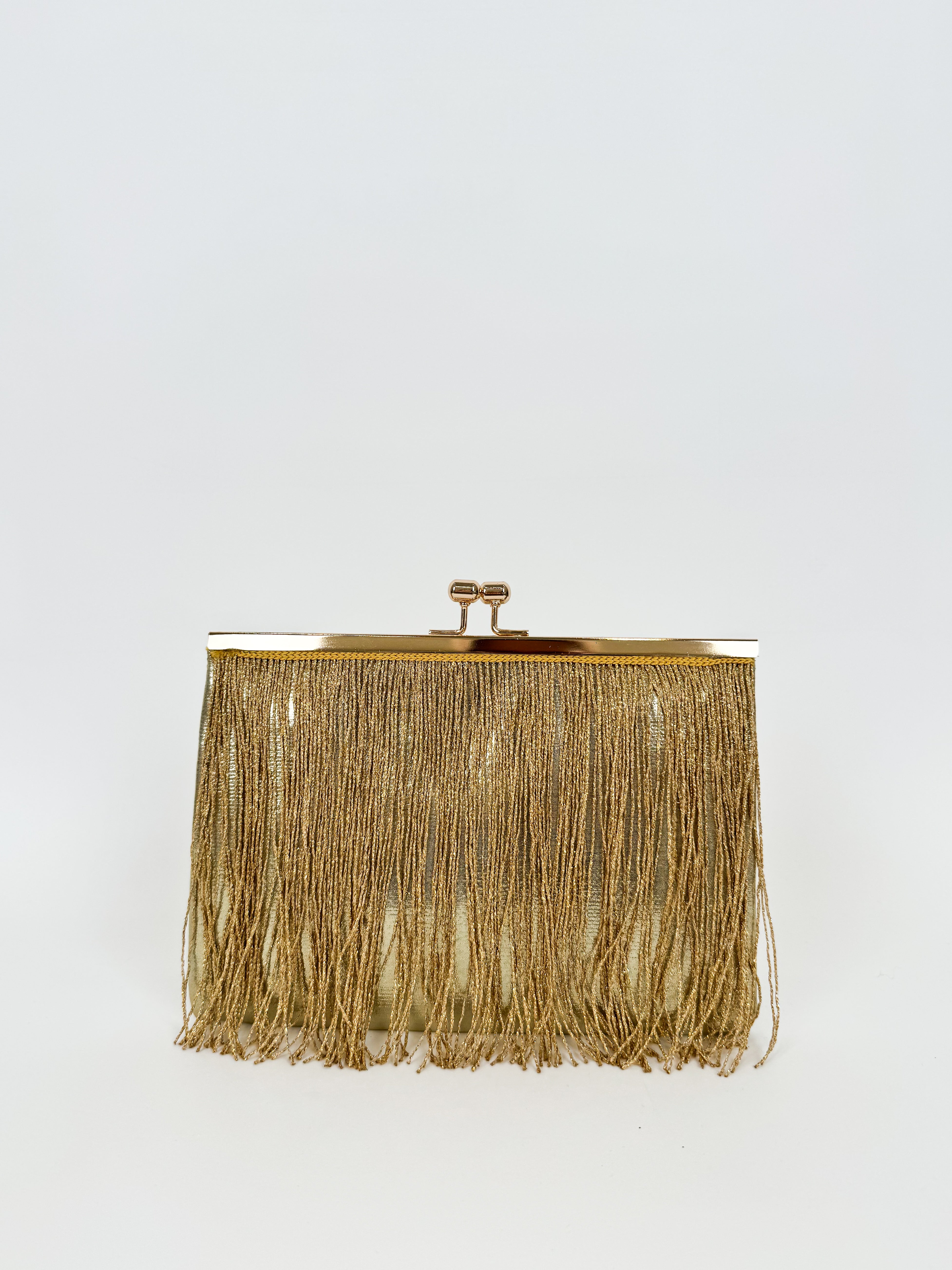 Gold fringed clutch