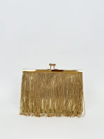 Gold fringed clutch