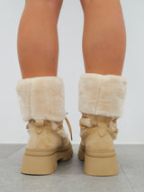 Beige furry ankle boots with laces detail