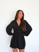 Fluid black mini bow dress