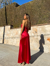 Long red draped halter dress