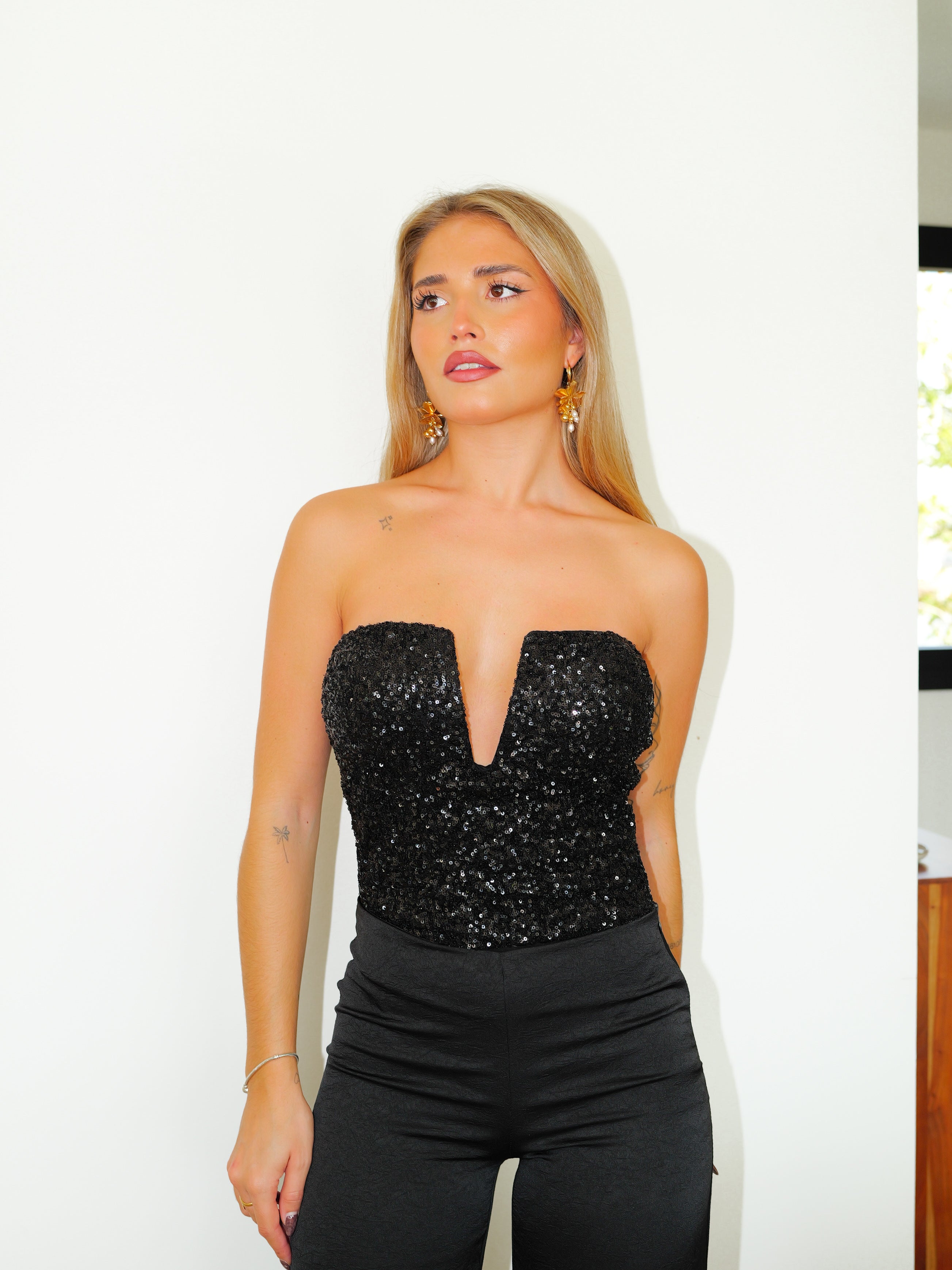 Black sequinned v-neck bodysuit