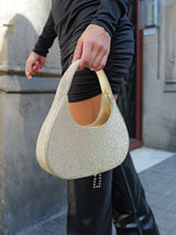 Gold glitter handbag