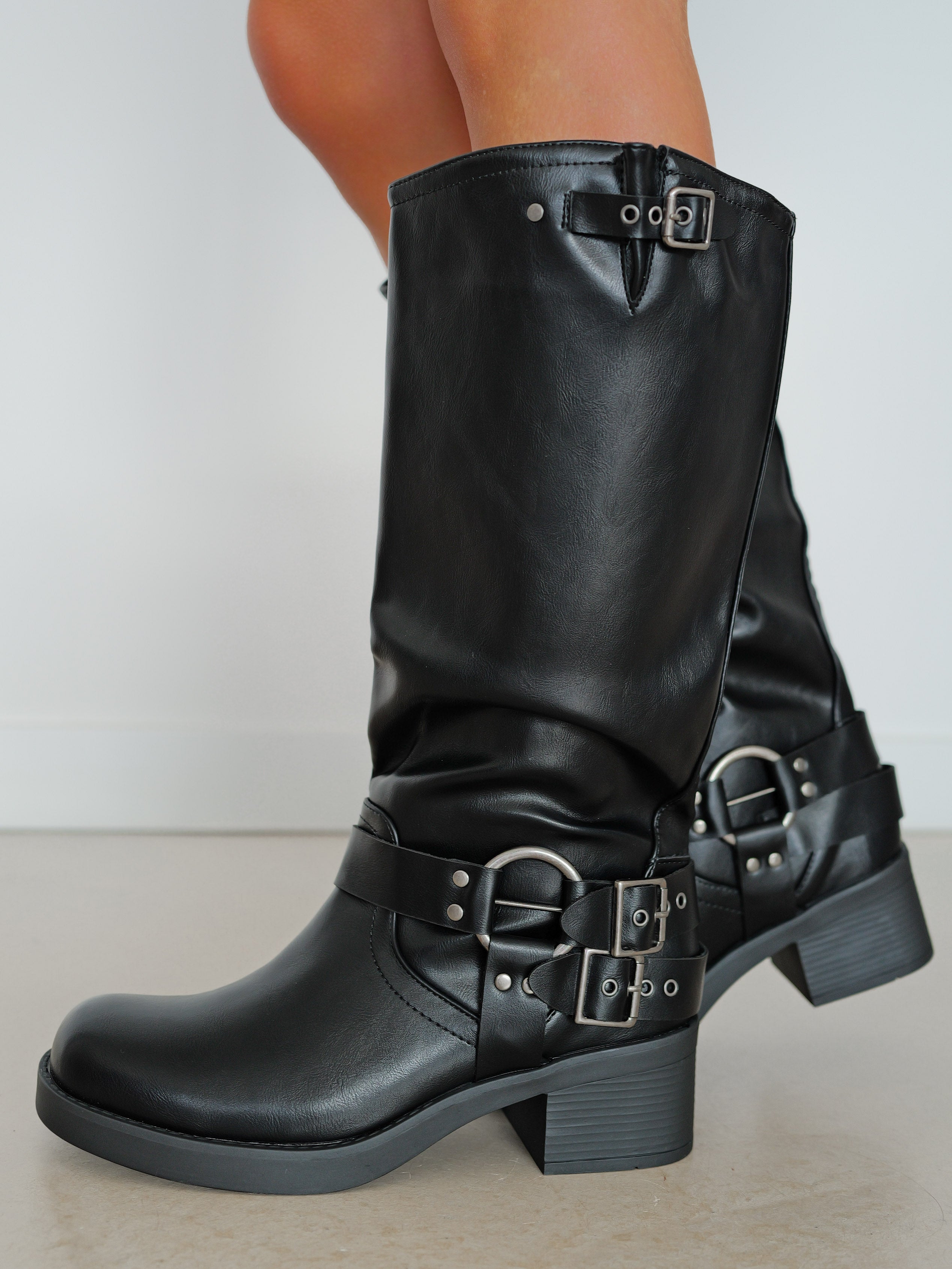 Black buckle track boot