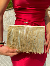 Gold fringed suede clutch