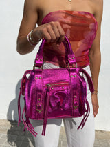 Fuchsia shiny leather buckles bag