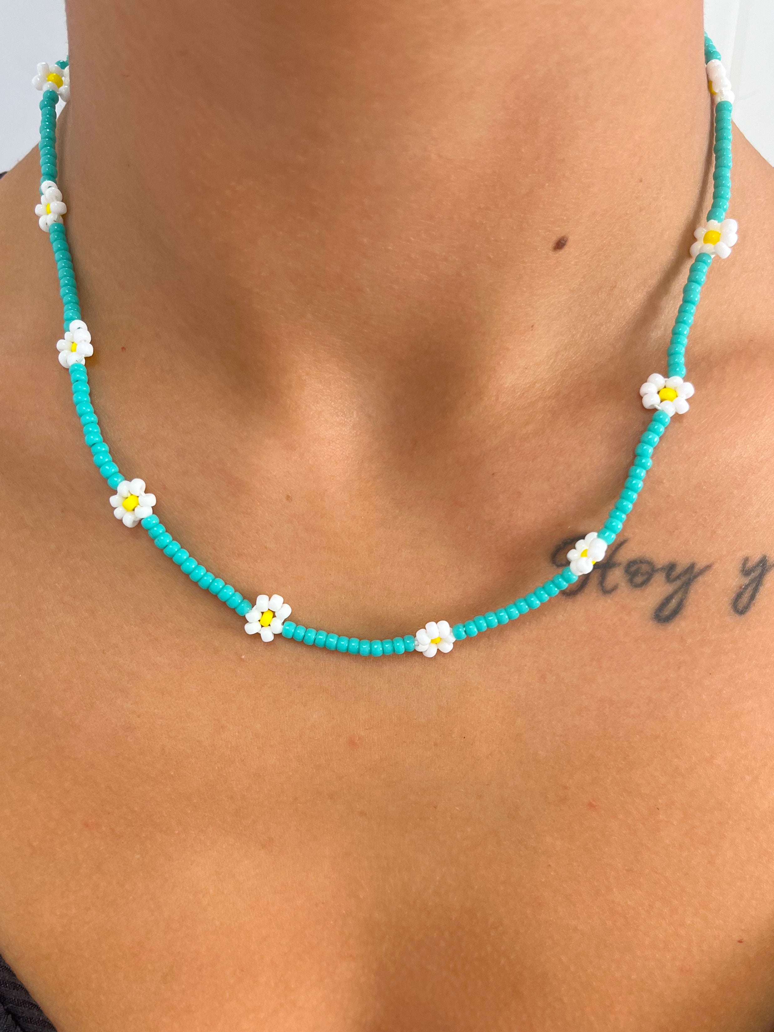 Turquoise necklace white flowers