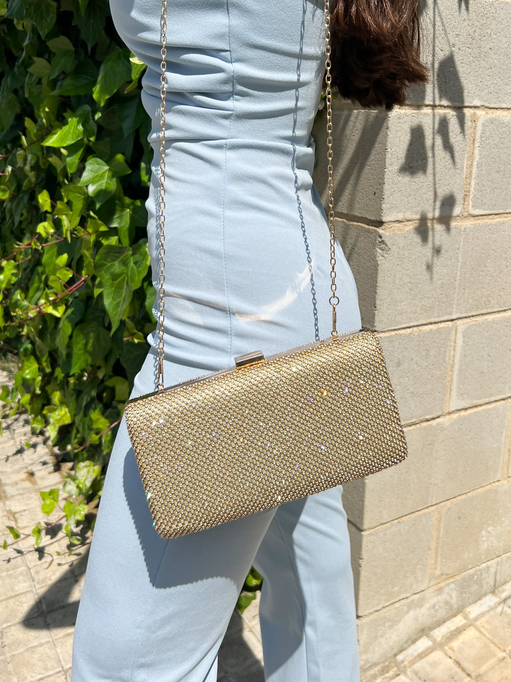 Gold glitter effect clutch