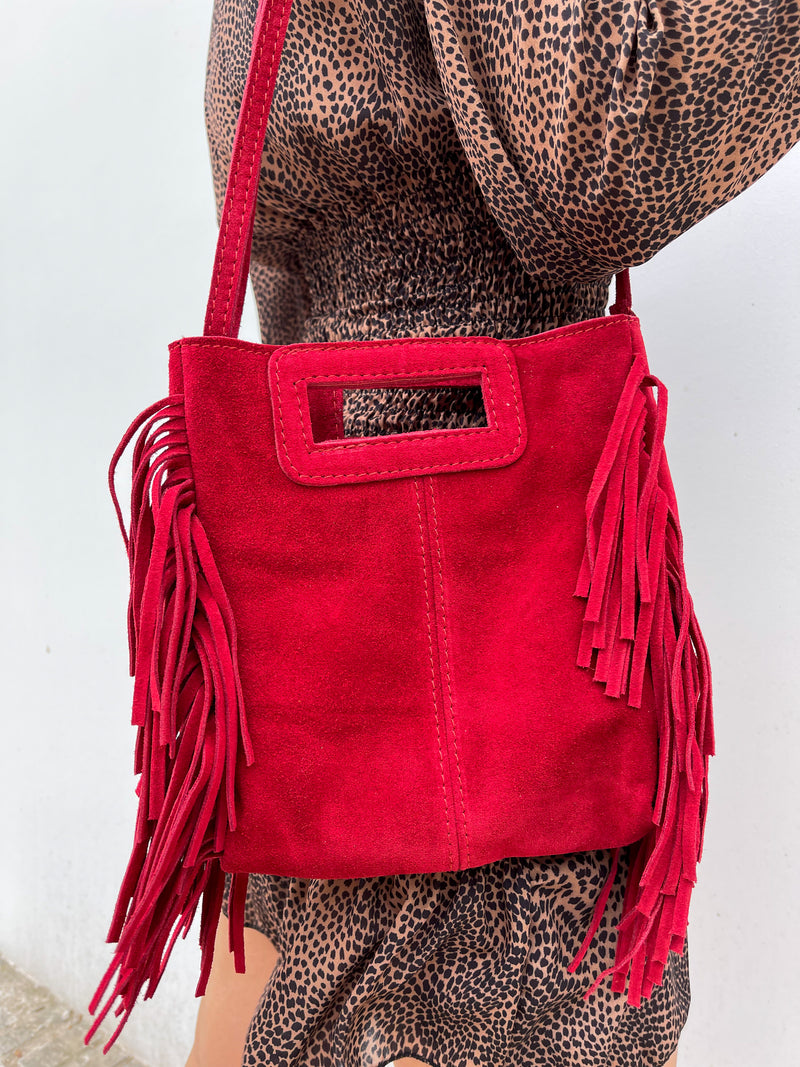 Red fringed leather bag