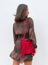 Red fringed leather bag