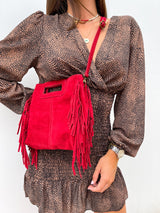 Red fringed leather bag