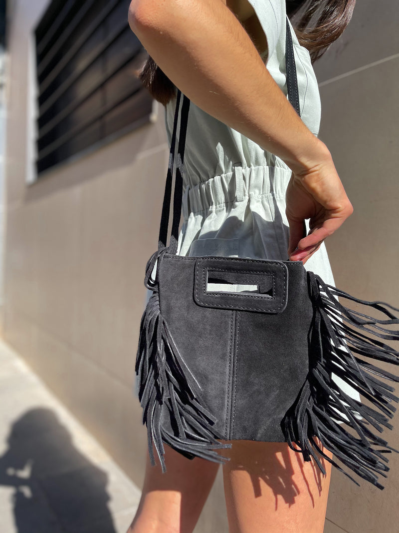 Black fringed leather bag