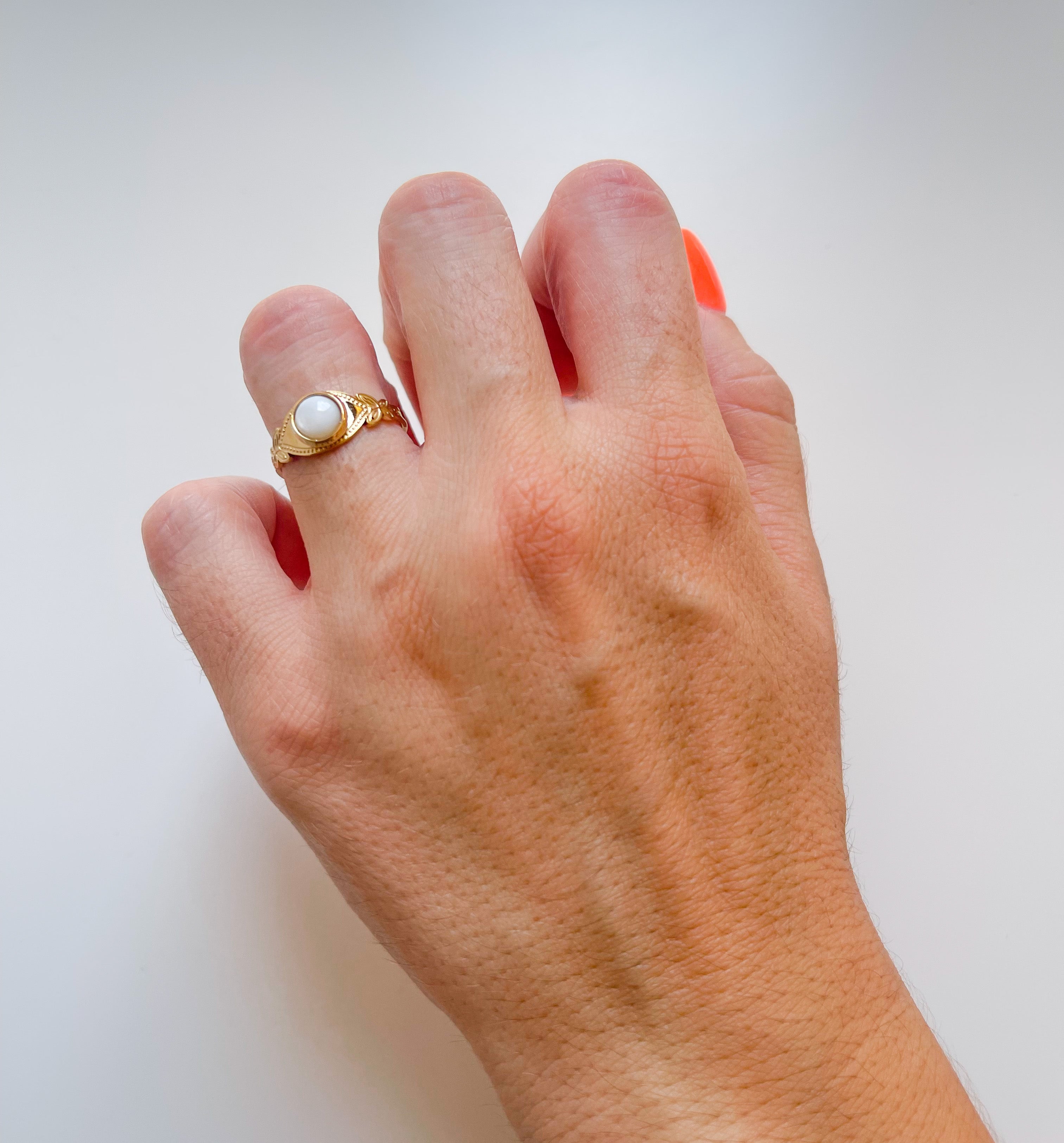 Golden white stone ring