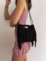 Black fringed leather bag