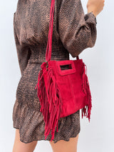 Red fringed leather bag