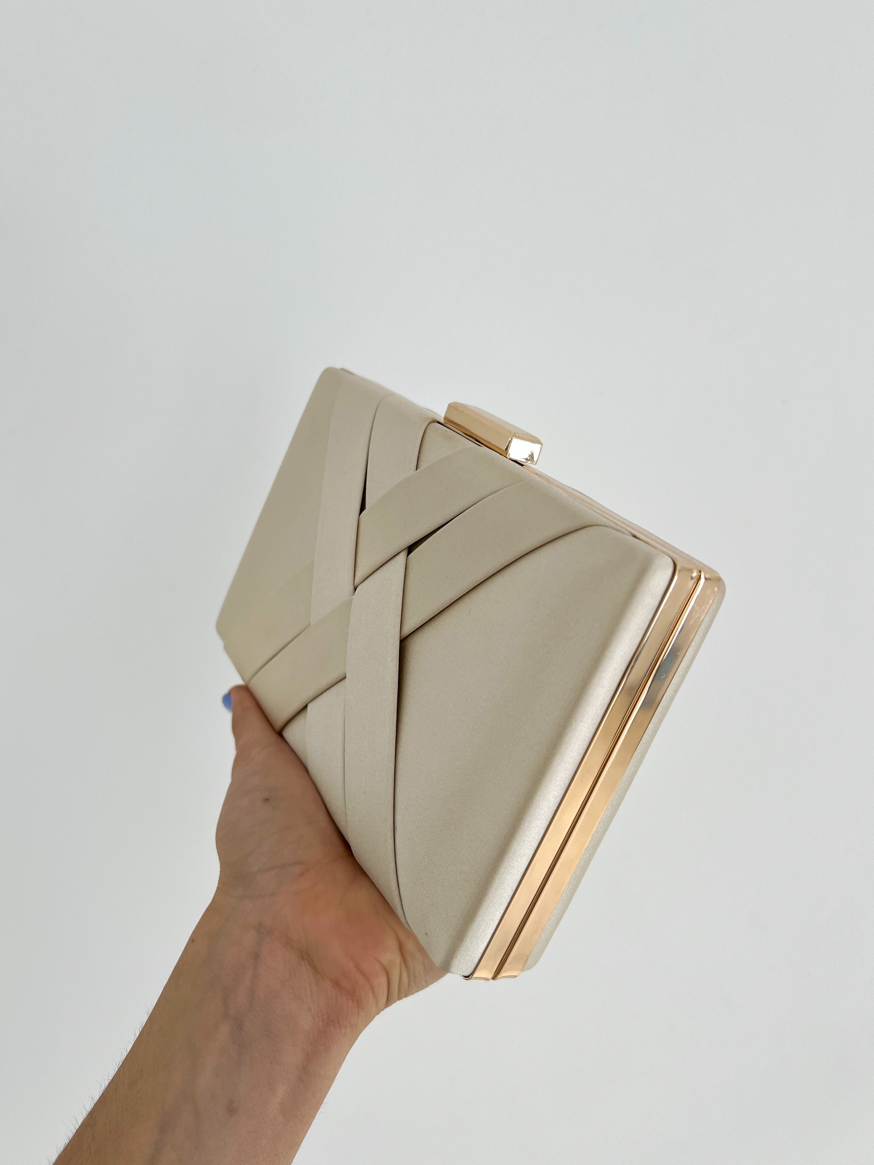 Gold satin clutch