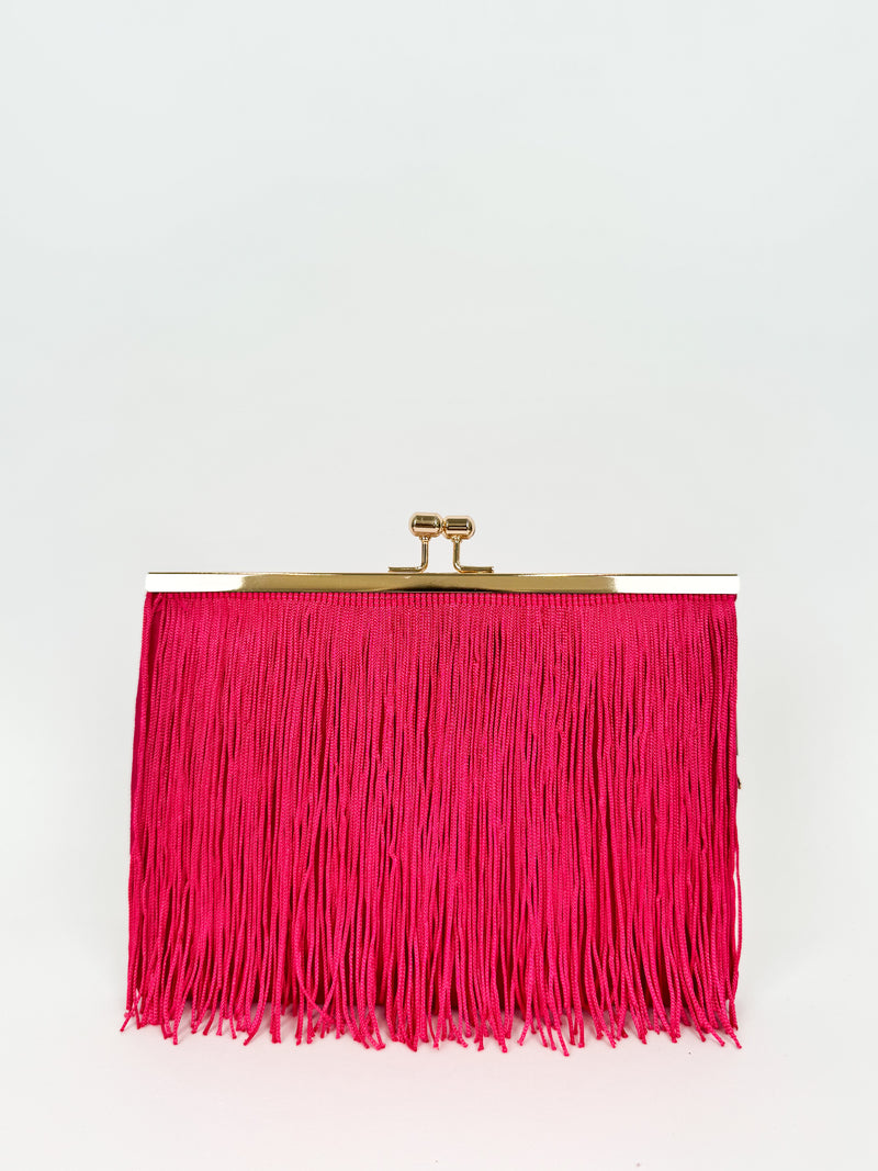 Pochette en daim frangée fuchsia