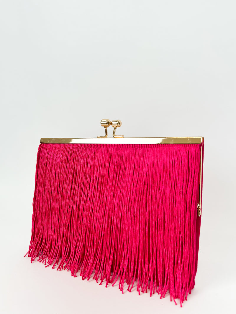 Pochette en daim frangée fuchsia