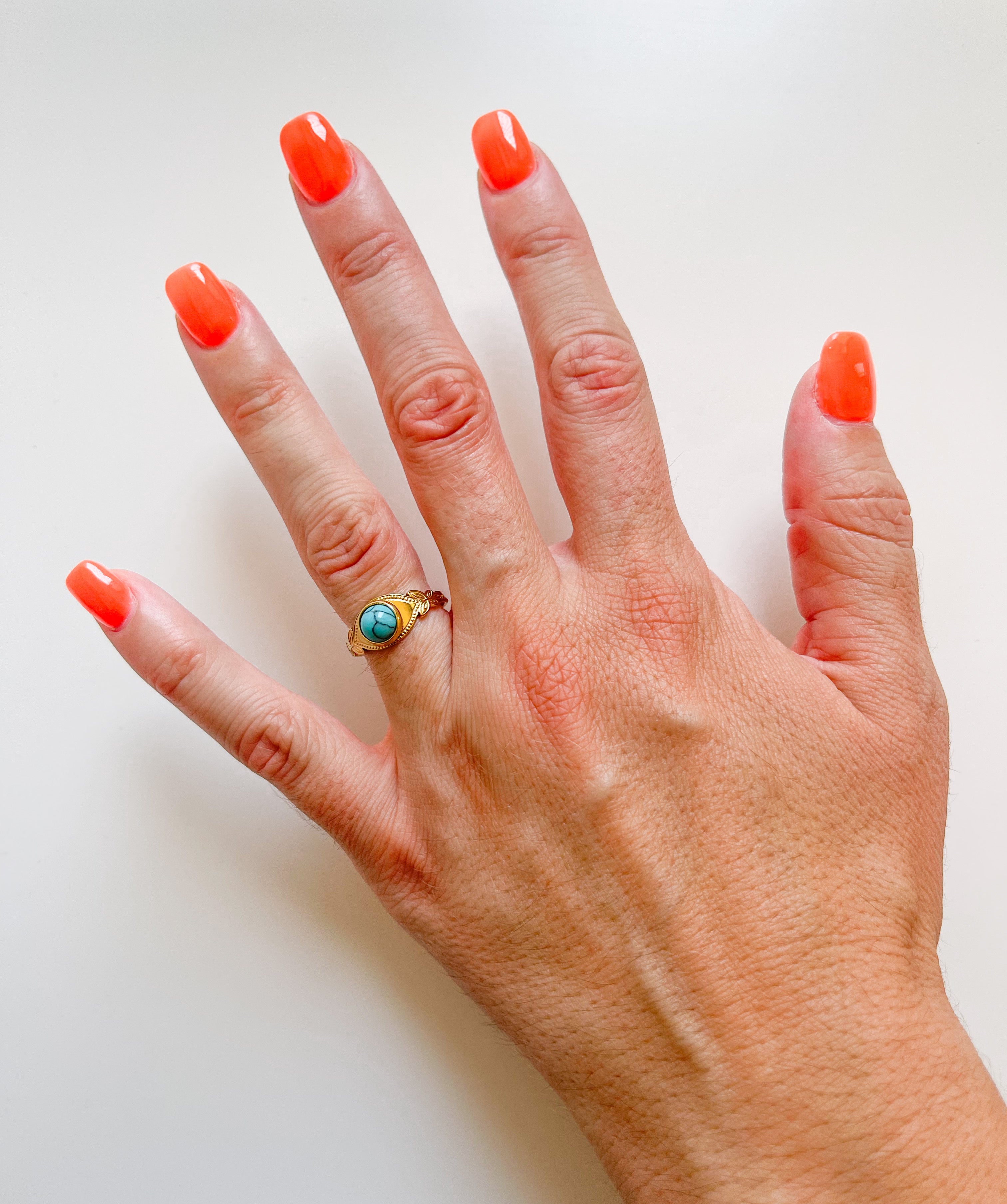 Bague en turquoise dorée