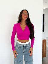 Top a coste con scollo a V color fucsia